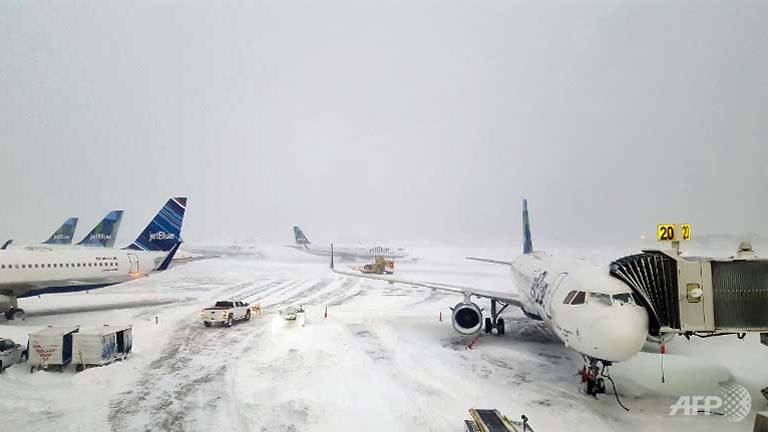 new york airport terminal flooded as brutal cold grips us east coast