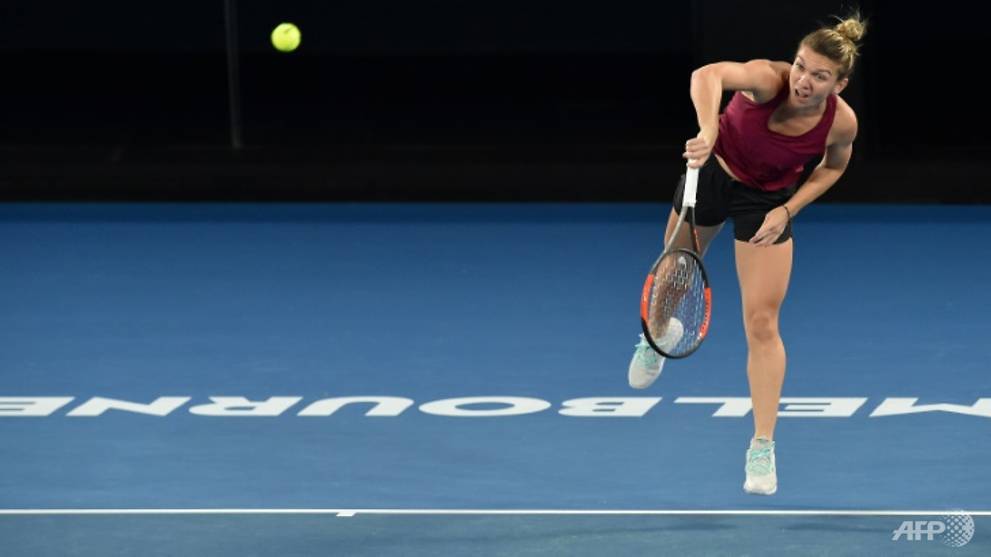 Lady in red, Halep hopes 'lucky' dress brings first Slam
