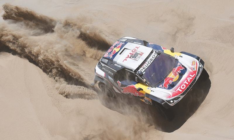 sainz stays on dakar title course