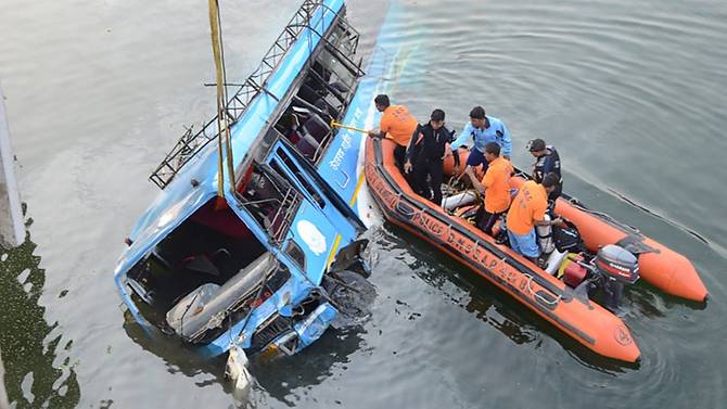 Bus plunges into river in India, at least 36 dead