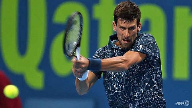 djokovic eases to opening qatar win thiem crashes out