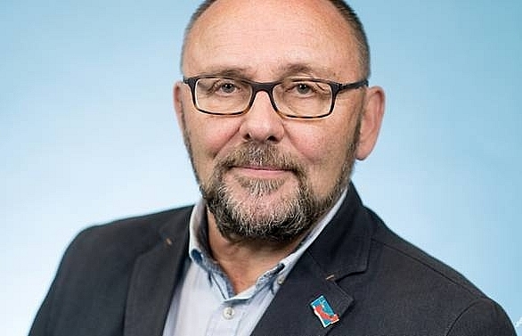 Merkel leads condemnations of attack on far-right MP