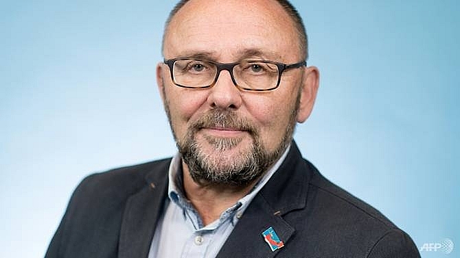 merkel leads condemnations of attack on far right mp