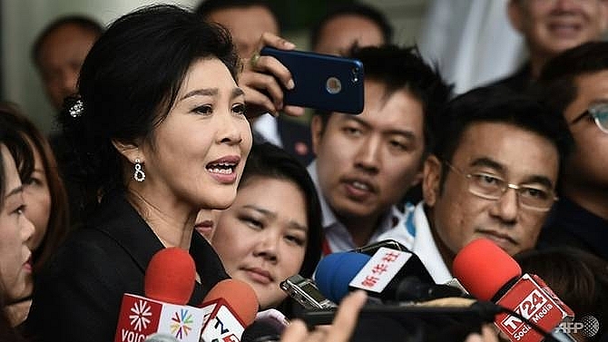 hong kong filings show thailands yingluck has cambodian passport