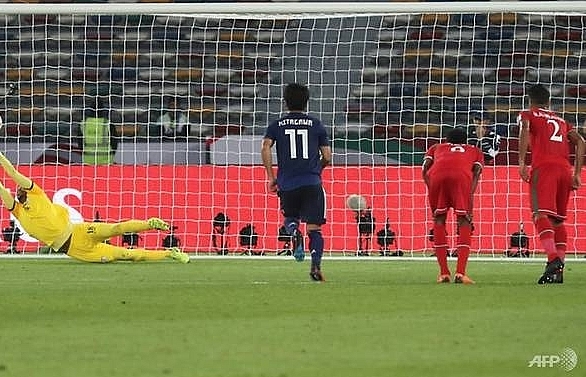 'Lucky' Japan reach Asian Cup knockouts as Qatar hit North Korea for six
