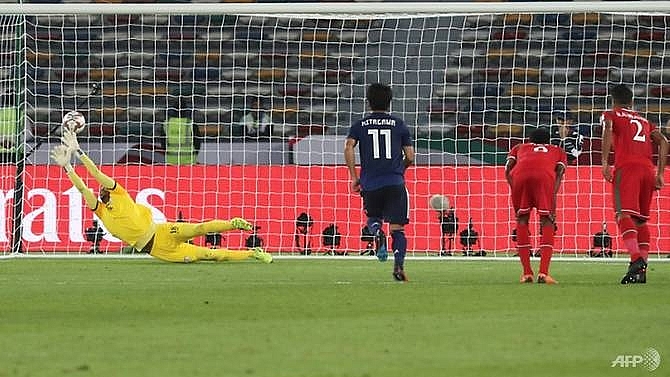 lucky japan reach asian cup knockouts as qatar hit north korea for six