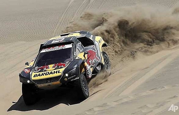 Loeb wins Dakar stage, Al-Attiyah close to overall victory