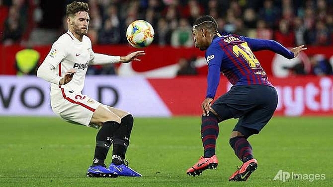 barcelona left with mountain to climb after cup defeat by sevilla