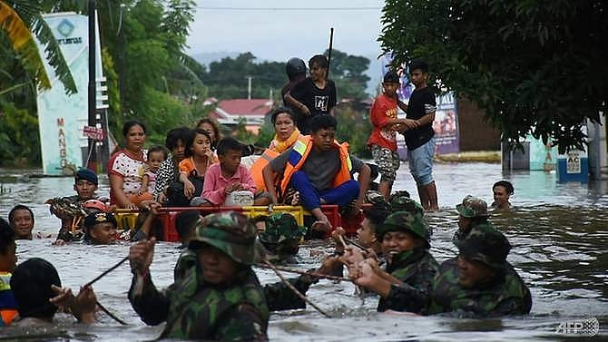 indonesia flood landslide death toll rises to 26