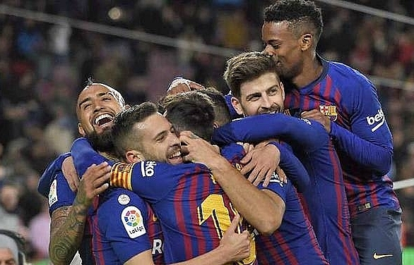 Barcelona hit Sevilla for six to book semi-final place