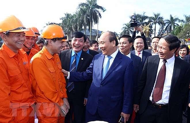 pm phuc pays pre tet visit to workers in hai phong