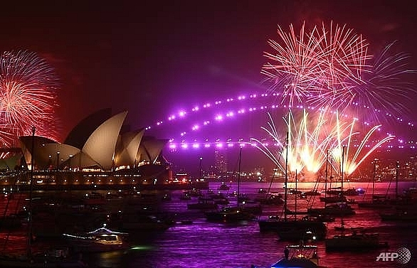 world welcomes new year amid wildfires and protests