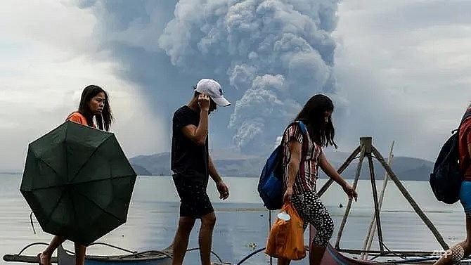 thousands face uncertainty as philippine volcano spews lava