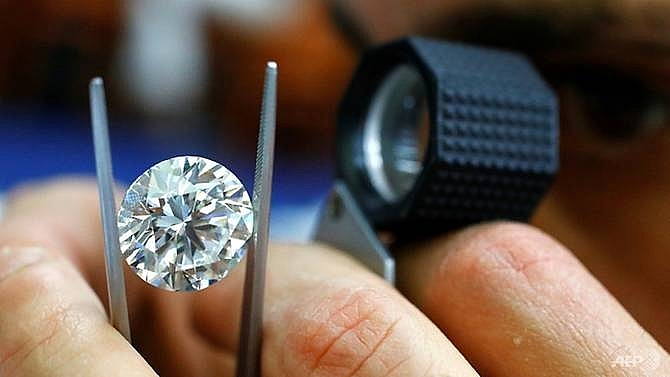 three romanians face french trial over us 1m diamond swindle