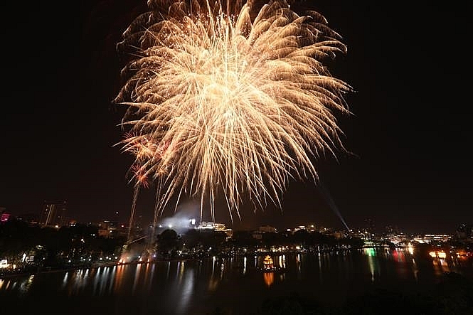 fireworks light up sky on new year eve