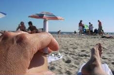 new york mayor bans smoking in parks beaches