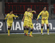 Dortmund's Paraguayan striker Lucas Barrios celebrates scoring the second goal with his teammates during the German first division Bundesliga football match 1.