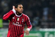 AC Milan's Brazilian forward Robinho celebrates after scoring during the UEFA Champions League round of 16 first leg match AC Milan vs Arsenal at San Siro stadium in Milan. AC Milan won 4-0