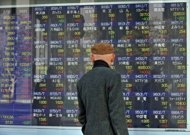 Asian shares pushed higher by China, US