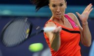 Jelena Jankovic of Serbia returns the ball to Angieszka Radwanska of Poland during their WTA Dubai Open semi-final tennis match in the Gulf emirate on February 24. Former world number one Jankovic scraped through the opening round of the BMW Malaysian Open on Tuesday, barely beating Caroline Garcia of France in a hard-fought three-set thriller