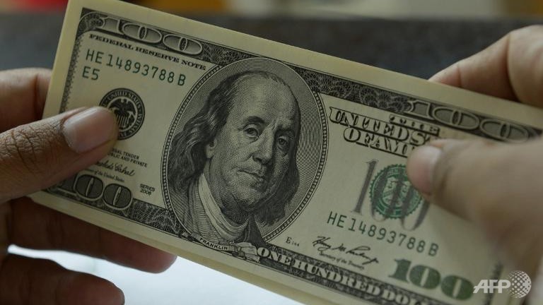 dollar dips vs euro amid weak us data