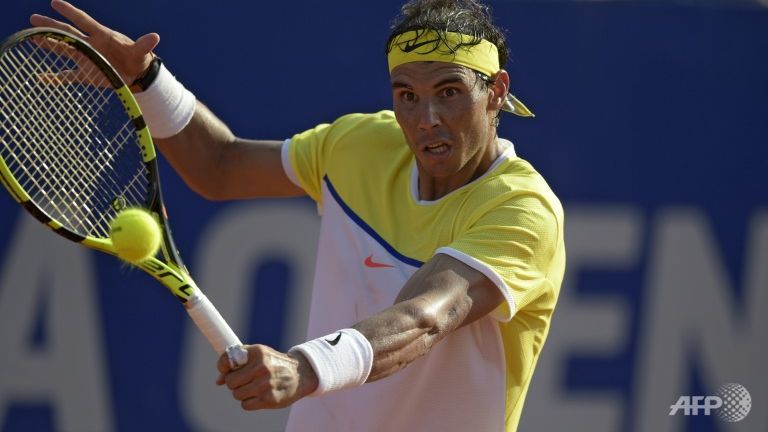 nadal through to semi final as dolgopolov injured