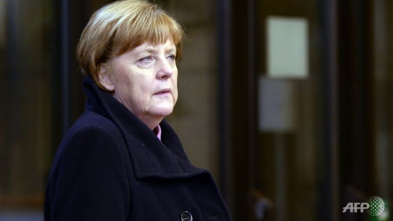 eu cant let greece plunge into chaos in refugee crisis merkel