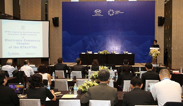 apec officials seek new form of co operation