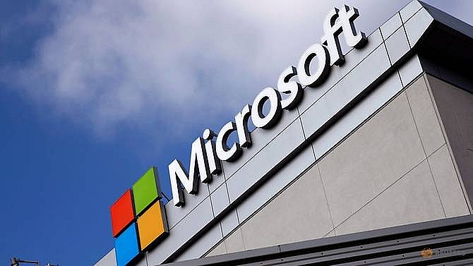 microsoft reports loss due to tax charge