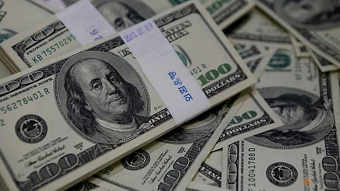 dollar on back foot despite fed signal on rate hikes