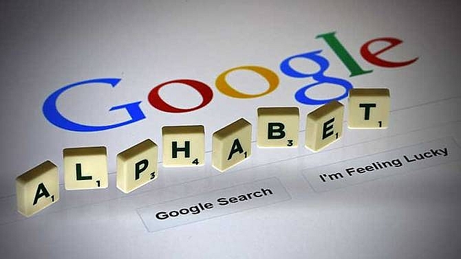 google parent hit by higher costs names new chairman