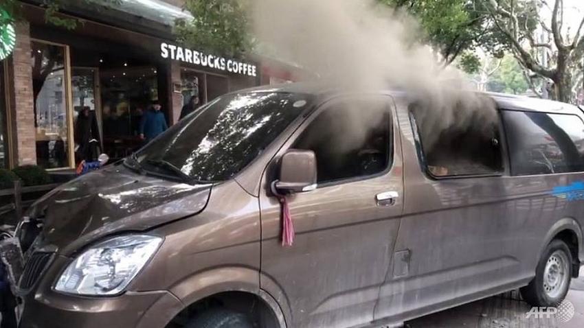 18 hurt as burning van slams into shanghai pedestrians