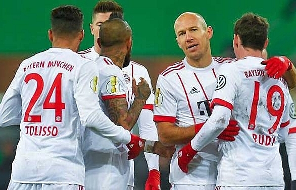 Robben nets twice as Bayern power into German Cup semi-finals