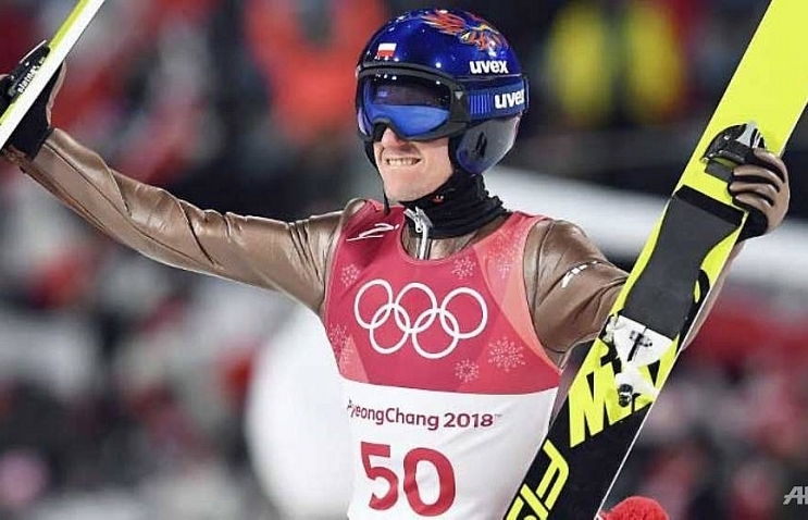 stoch retains ski jump title at the death