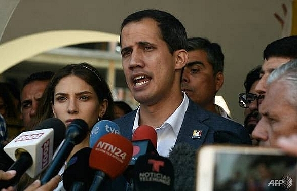 Venezuela's Guaido warns military on blocked aid