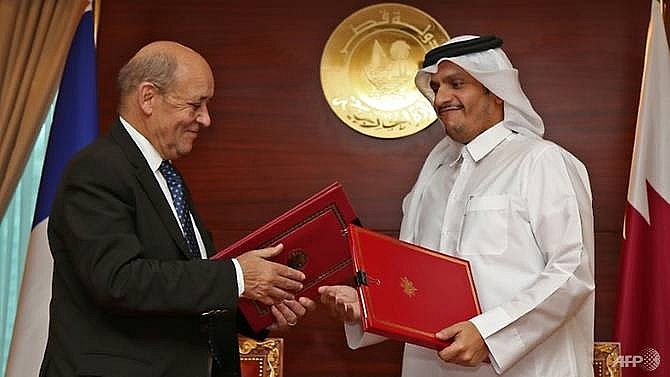 france agrees strategic pact with qatar