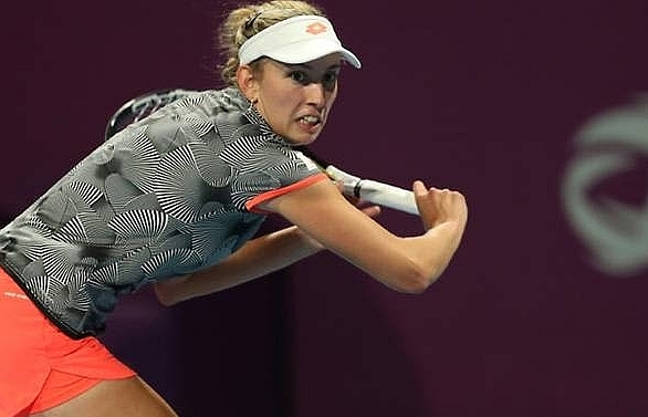 Mertens shrugs off back pain to beat Halep for Qatar Open title
