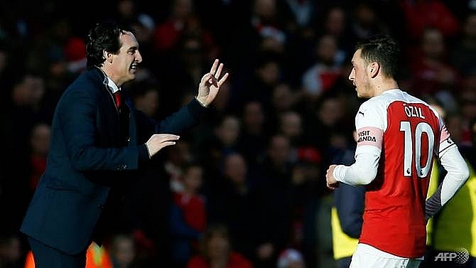 emery challenges ozil to prove his worth
