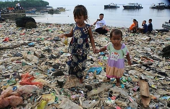 indonesians clean up the beach one sandal at a time