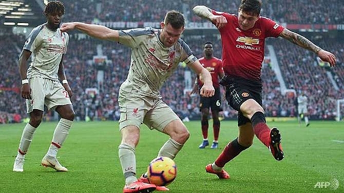 liverpool go top after stalemate at injury hit united