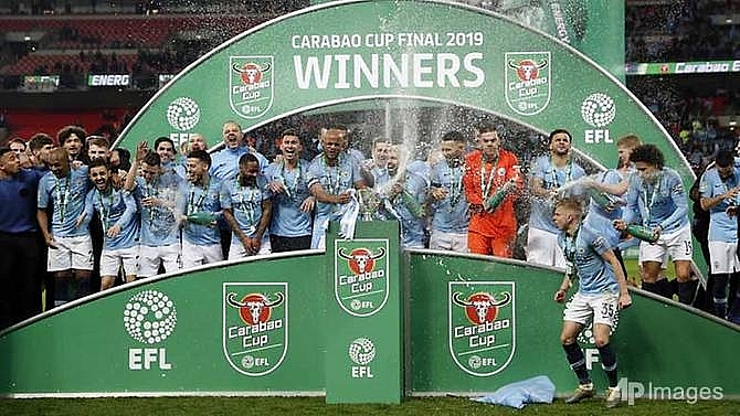 man city win league cup final marked by chelsea keeper controversy