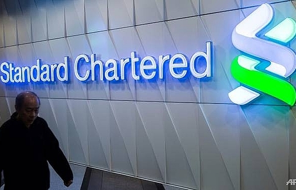 Standard Chartered's 2018 profits rise despite setting aside cash for fines