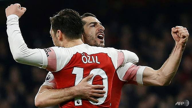 ozil leads five star arsenal past bournemouth