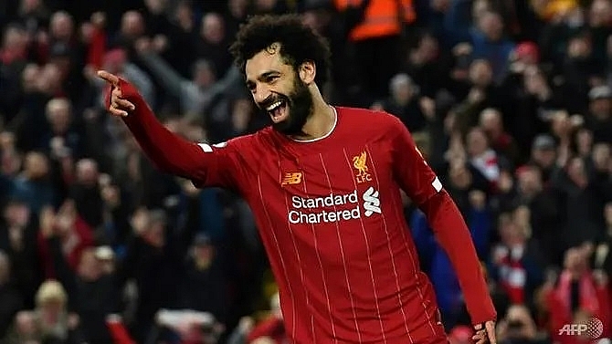 african players in europe salah double moves liverpool closer to title