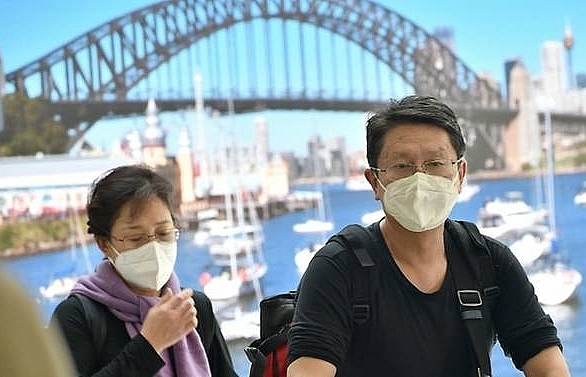 australia warns covid 19 pandemic now upon us