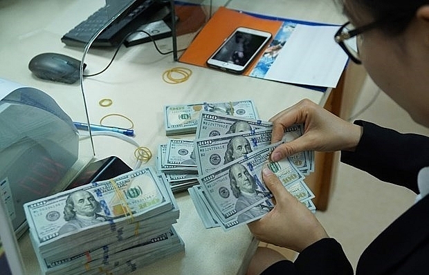 Reference exchange rate down 10 VND on February 28