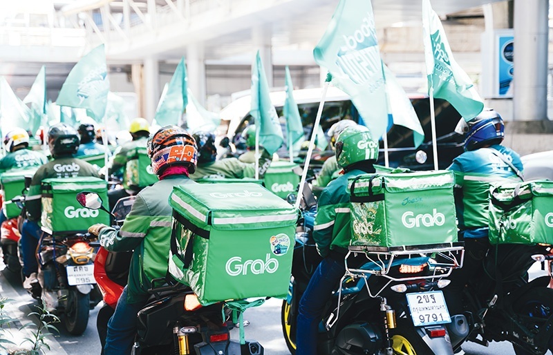 Motorbike taxis take to the streets in joyous return
