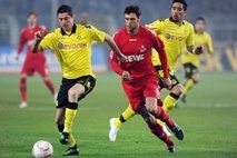 dortmund down cologne to open 15 point lead