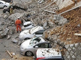 Record quake unleashes tsunami on Japan
