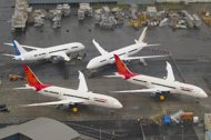 In-production Boeing 787 Dreamliner aircraft for Air India and other airlines sit on the tarmac at the Boeing production facility at Paine Field in Everett, Washington, on February 17. A seven-year dispute between aerospace giants Airbus and Boeing comes to a head on Wednesday when the World Trade Organization rules on an EU complaint against US government support for Boeing.